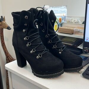 Black suede never worn. All man made materials, size 7